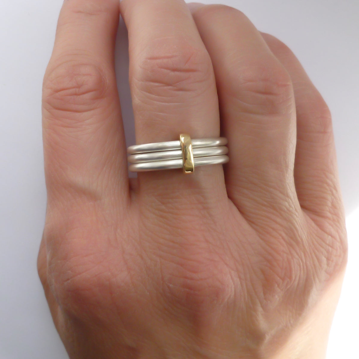 Modern unique and bespoke contemporary silver gold and diamond two band stacking ring by Sue Lane