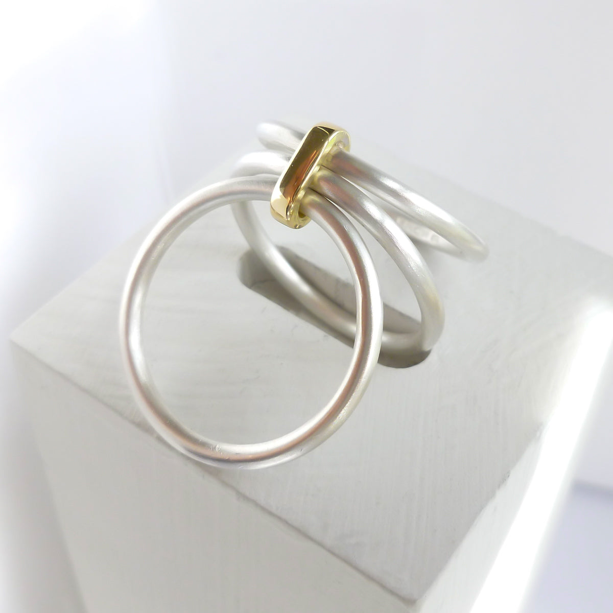 Modern unique and bespoke contemporary silver gold and diamond two band stacking ring by Sue Lane