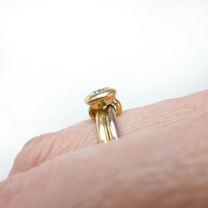 18ct white and yellow gold two band contemporary ring with certified diamond.