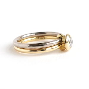 18ct white and yellow gold two band contemporary ring with certified diamond.