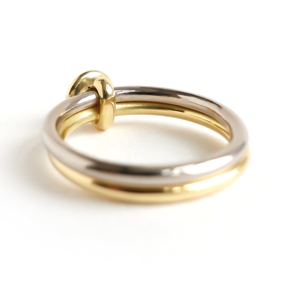18ct white and yellow gold two band contemporary ring with certified diamond.