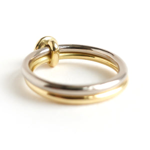 18ct white and yellow gold two band contemporary ring with certified diamond.