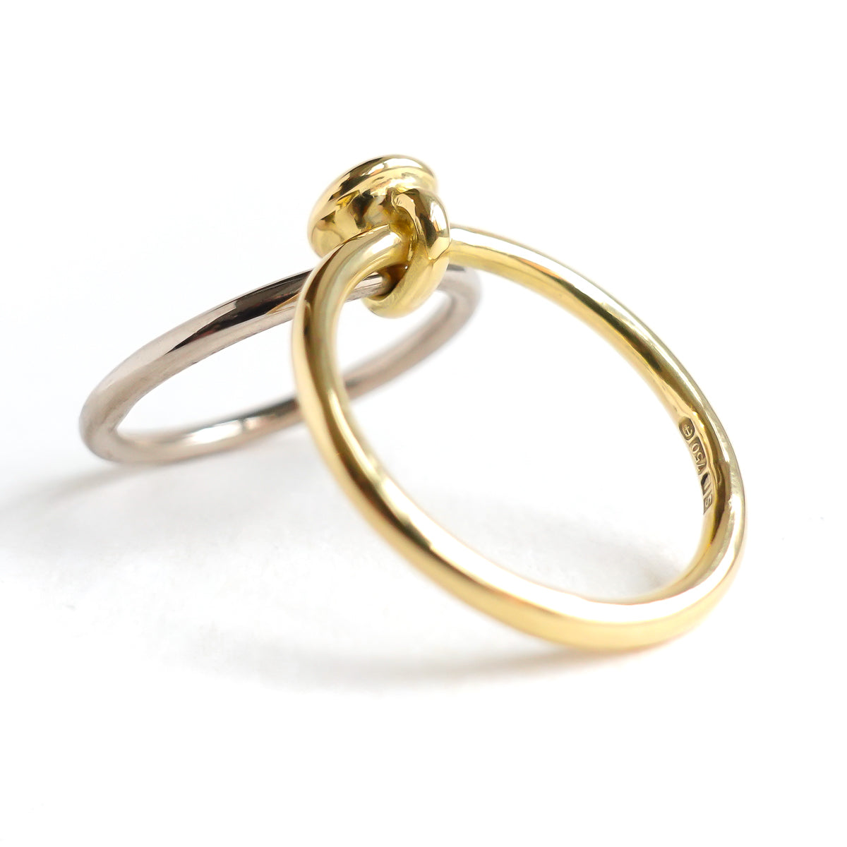 18ct white and yellow gold two band contemporary ring with certified diamond.
