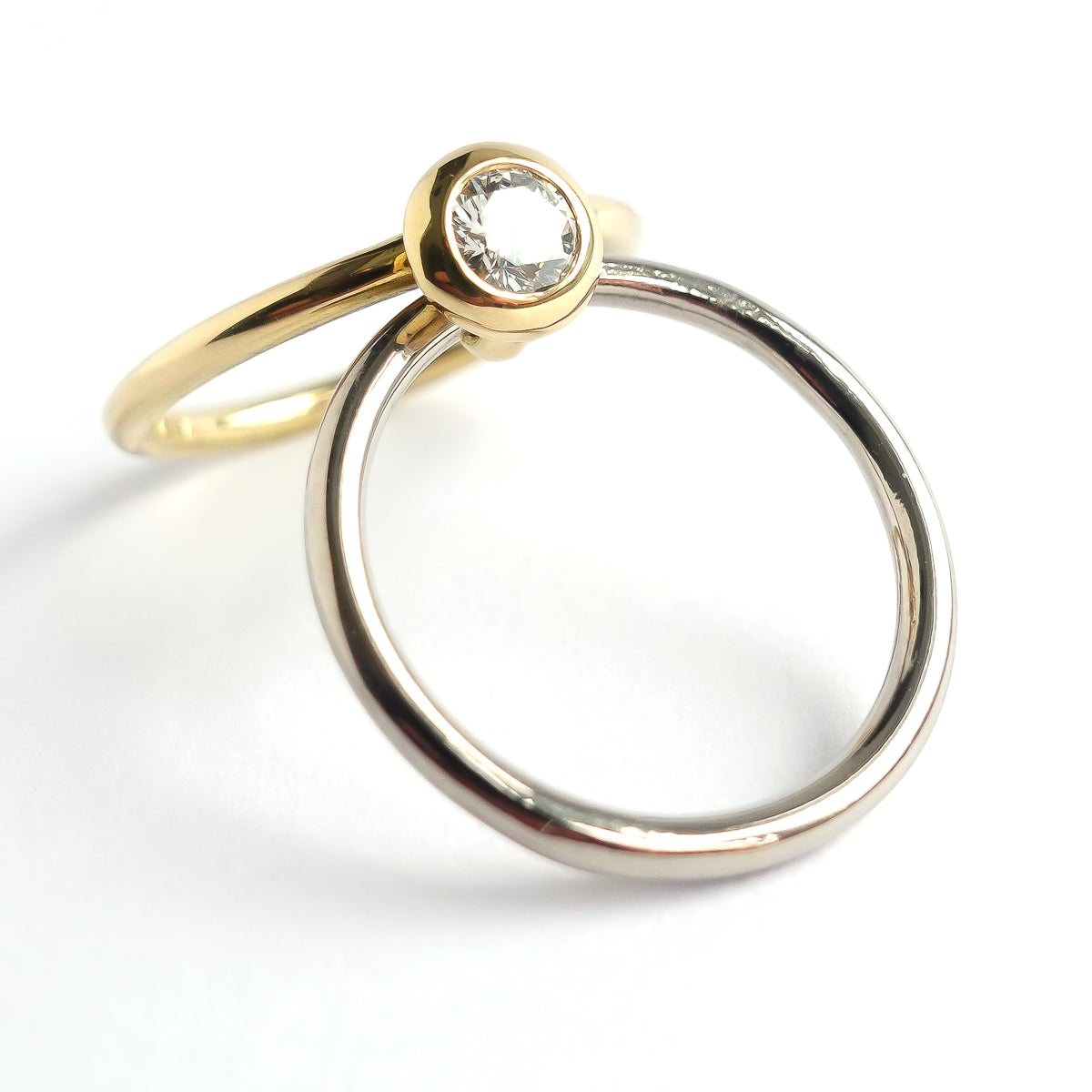18ct white and yellow gold two band ring with certified diamond