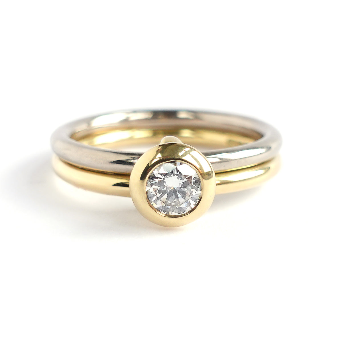 18ct white and yellow gold two band contemporary ring with certified diamond.