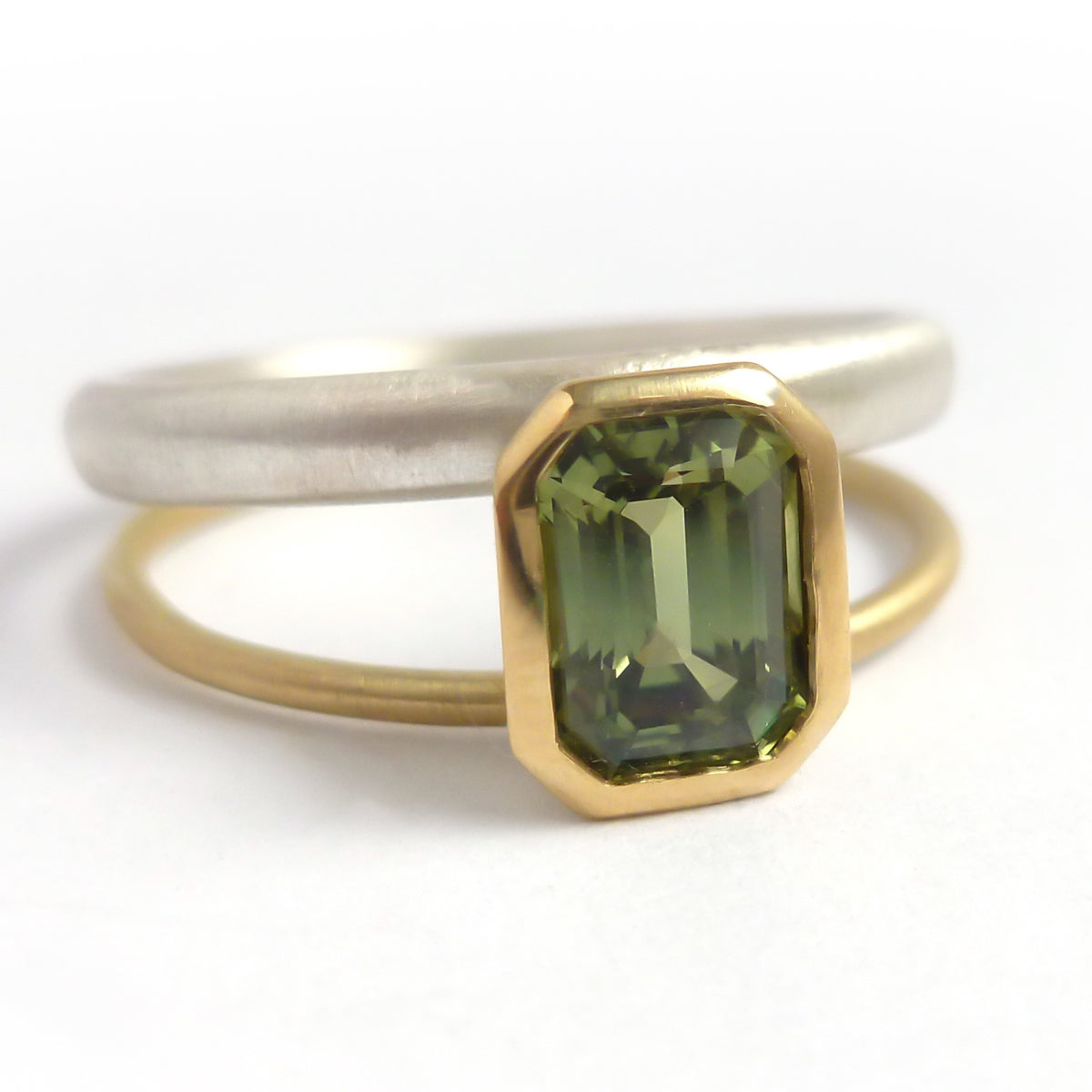 Octagonal green sapphire two tone dress or engagement ring - silver gold and contemporary.