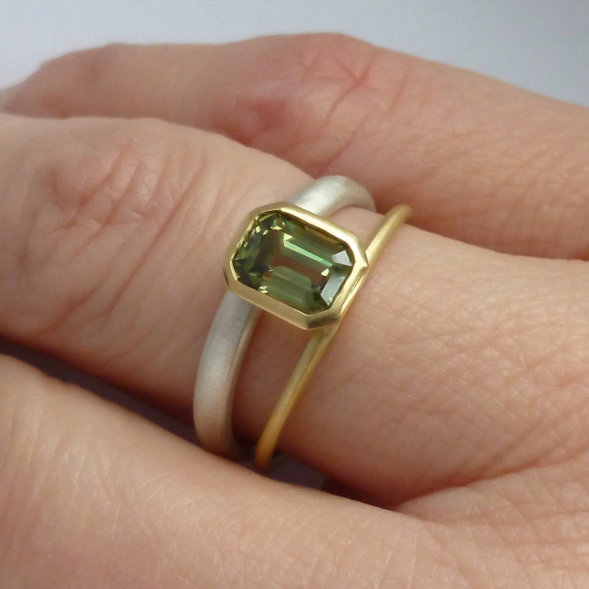 Octagonal green sapphire two tone dress or engagement ring - silver gold and contemporary.