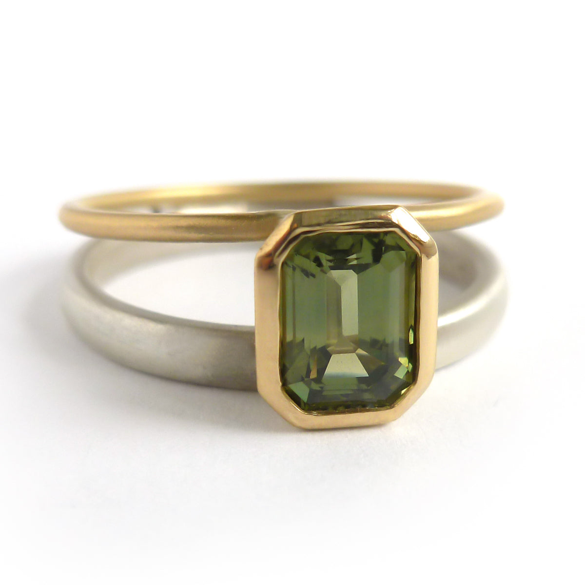 Octagonal green sapphire two tone dress or engagement ring - silver gold and contemporary.