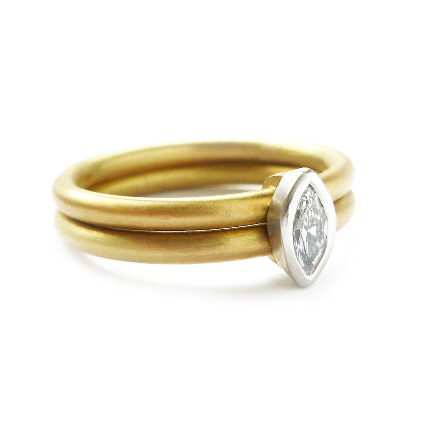 A unique, contemporary diamond ring. Multi band ring or interlocking ring, sometimes called double band ring too.