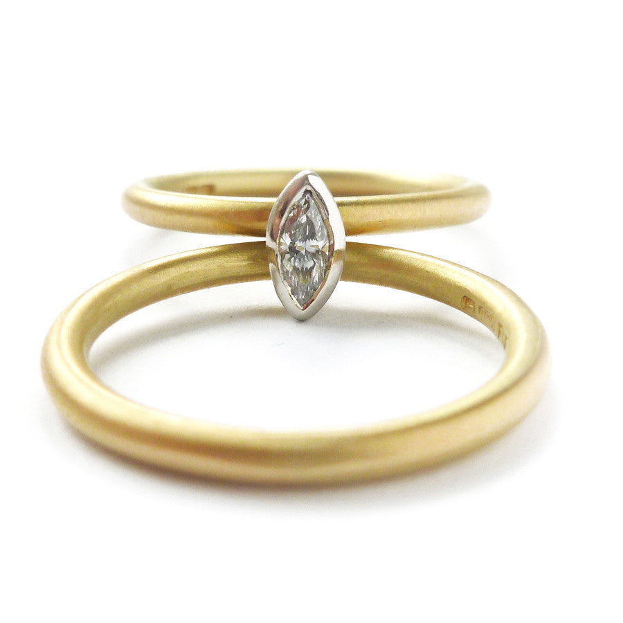 Contemporary, modern and bespoke 18k yellow gold and platinum marquise diamond ring. Handmade stacking ring by Sue Lane Jewellery. A unique engagement ring. Multi band ring or interlocking ring.
