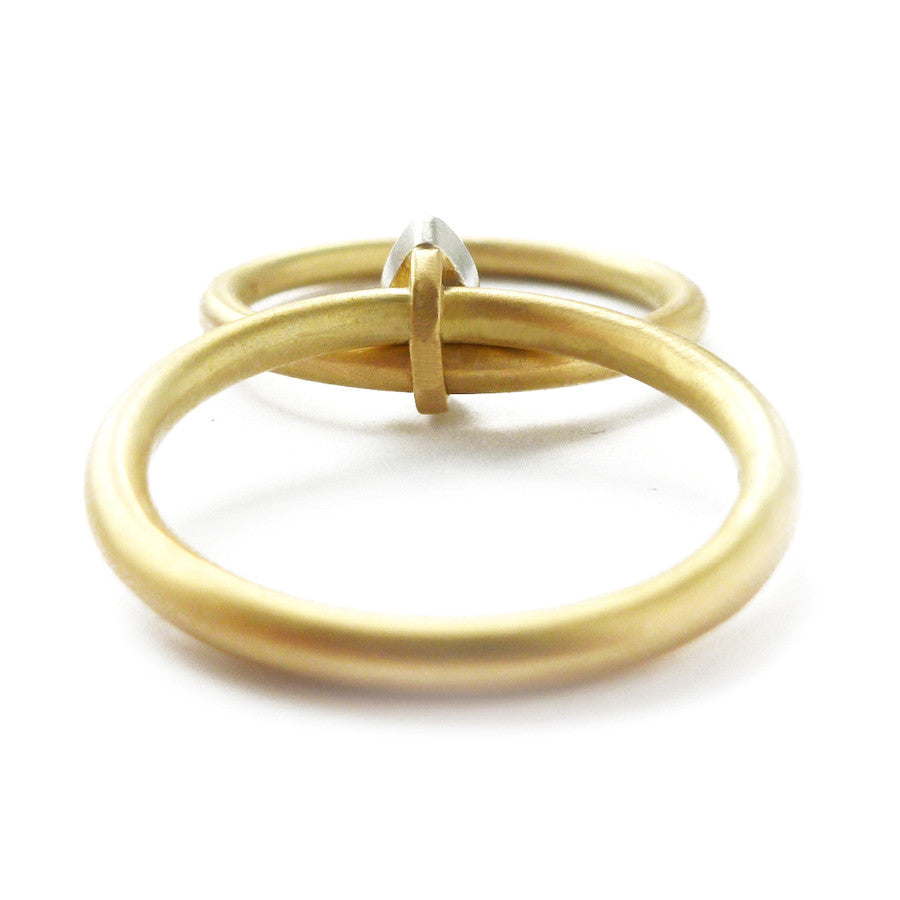 Contemporary, modern and bespoke 18k yellow gold and platinum marquise diamond ring. Handmade stacking ring by Sue Lane Jewellery. A unique engagement ring.