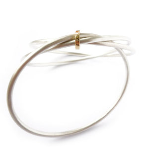 Unusual, unique, bespoke and modern silver and gold Russian style bangle with brushed finish. Handmade by Sue Lane Jewellery in Herefordshire, UK