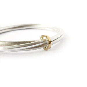 Unusual, unique, bespoke and modern silver and gold Russian style bangle with brushed finish. Handmade by Sue Lane Jewellery in Herefordshire, UK