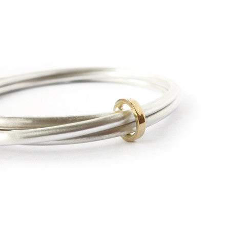 Unusual, unique, bespoke and modern silver and gold Russian style bangle with brushed finish. Handmade by Sue Lane Jewellery in Herefordshire, UK