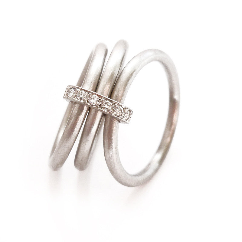 Unusual, unique, bespoke and modern Platinum and diamond wedding ring, contemporary eternity ring, engagement ring, Handmade by Sue Lane in Herefordshire, UK. Multi band ring or interlocking ring, sometimes called triple band rings too.
