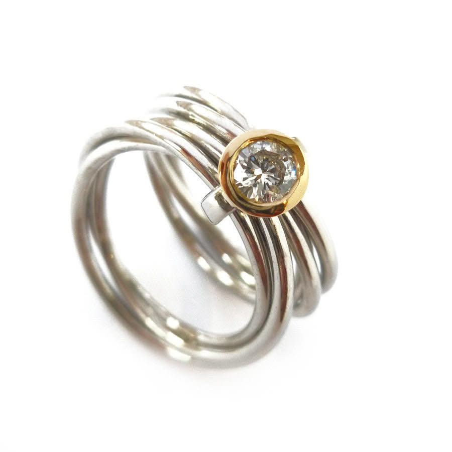 Unusual, unique, bespoke and modern Russian style platinum and diamond wedding ring, contemporary engagement ring. Multi band ring or interlocking ring.