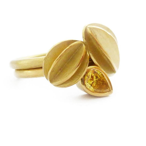 Unusual, unique, bespoke and modern statement gold yellow diamond stacking dress ring set handmade by designer maker Sue Lane contemporary Jewellery, UK