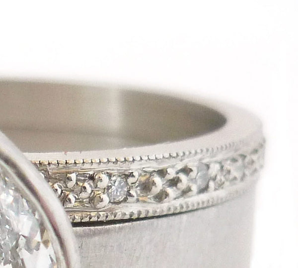 Contemporary, unique, bespoke and modern platinum marquise diamond engagement / wedding ring, eternity ring, matt brushed finish. Handmade by Sue Lane in Herefordshire, UK