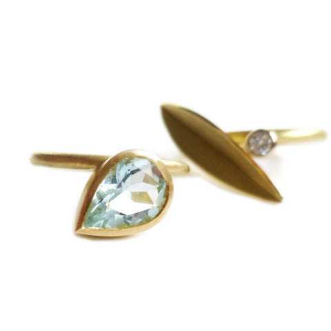 Unique, modern and contemporary two band ring, set with a pear shape aquamarine. Dress ring or alternative engagement ring. Handmade designer Sue Lane Jewellery