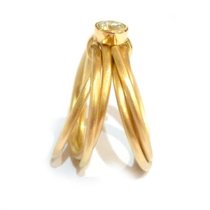 Contemporary, bespoke and modern 18k yellow gold russian style diamond wedding ring, commitment ring, eternity ring, brushed finish. Multi band ring or interlocking ring.
