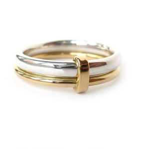 Unusual, unique, bespoke and modern women's/men’s wedding ring in silver and gold. Handmade by Sue Lane Jewellery in Herefordshire, UK. Unique wedding ring.