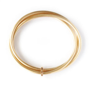 Unusual, unique, bespoke and modern gold Russian style bangle with brushed finish. Handmade by Sue Lane Contempoary Jewellery in Herefordshire, UK