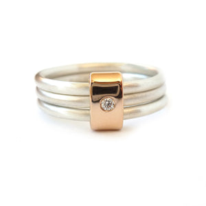 Unusual, bespoke and modern diamond wedding ring in silver and gold. Handmade by Sue Lane Contemporary Jewellery in Herefordshire, UK. Unique wedding ring.