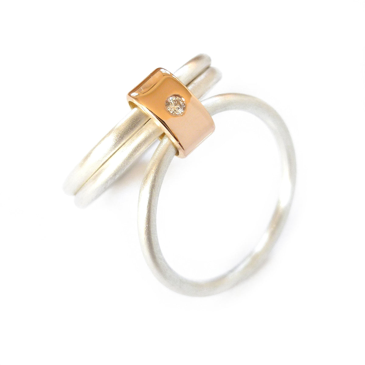 Unusual, bespoke and modern diamond wedding ring in silver and gold. Handmade by Sue Lane Contemporary Jewellery in Herefordshire, UK. Unique wedding ring.