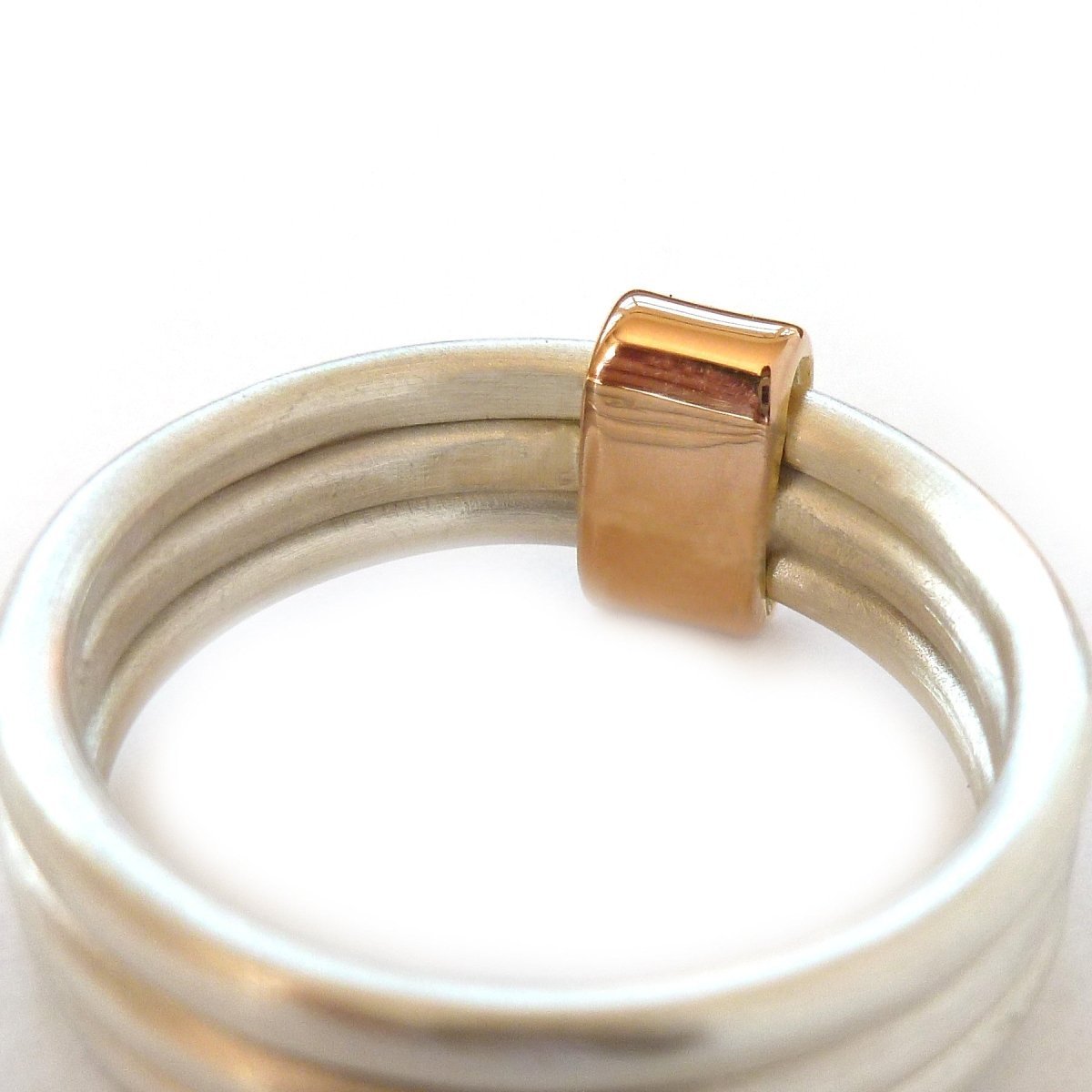 Unusual, bespoke and modern diamond wedding ring in silver and gold. Handmade by Sue Lane Contemporary Jewellery in Herefordshire, UK. Unique wedding ring.