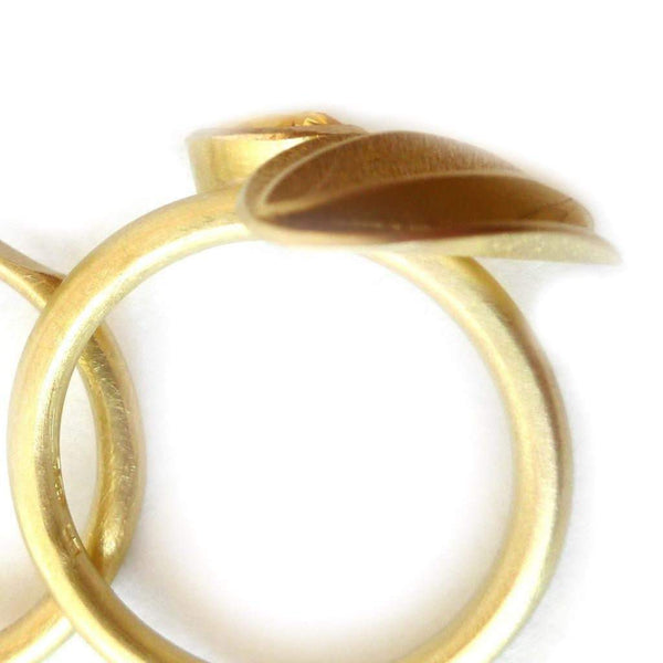 Unique, bespoke and modern statement gold and pear shape yellow sapphire and diamond stacking ringset handmade by designer Sue Lane contemporary Jewellery, UK