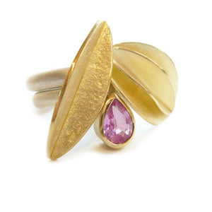 Unusual, unique, bespoke and modern statement gold and pear shape baby pink sapphire stacking ring set handmade by designer maker Sue Lane contemporary Jewellery, UK
