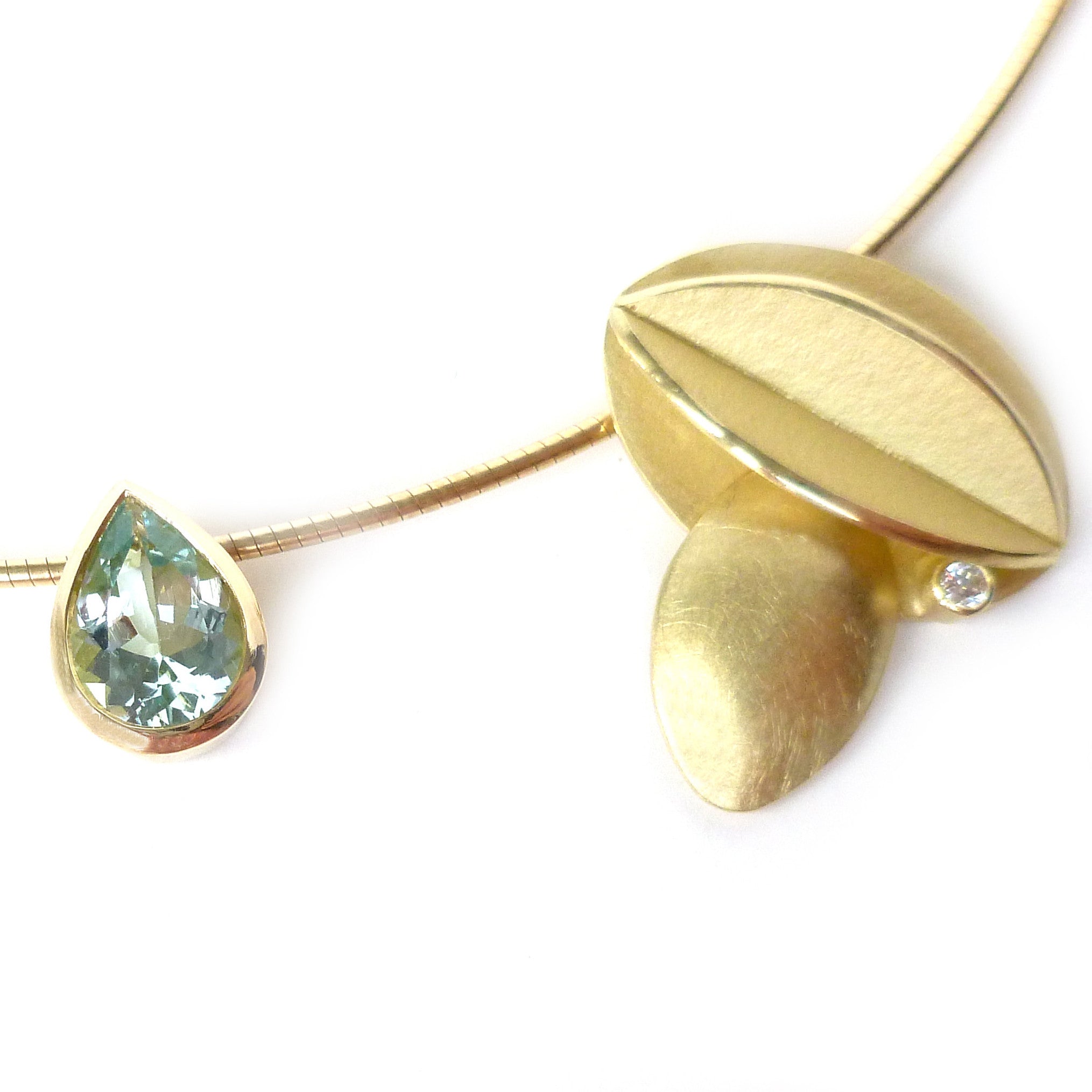 Contemporary bold and modern gold and aquamarine necklace handmade by designer maker Sue Lane Jewellery UK. Made to commission 