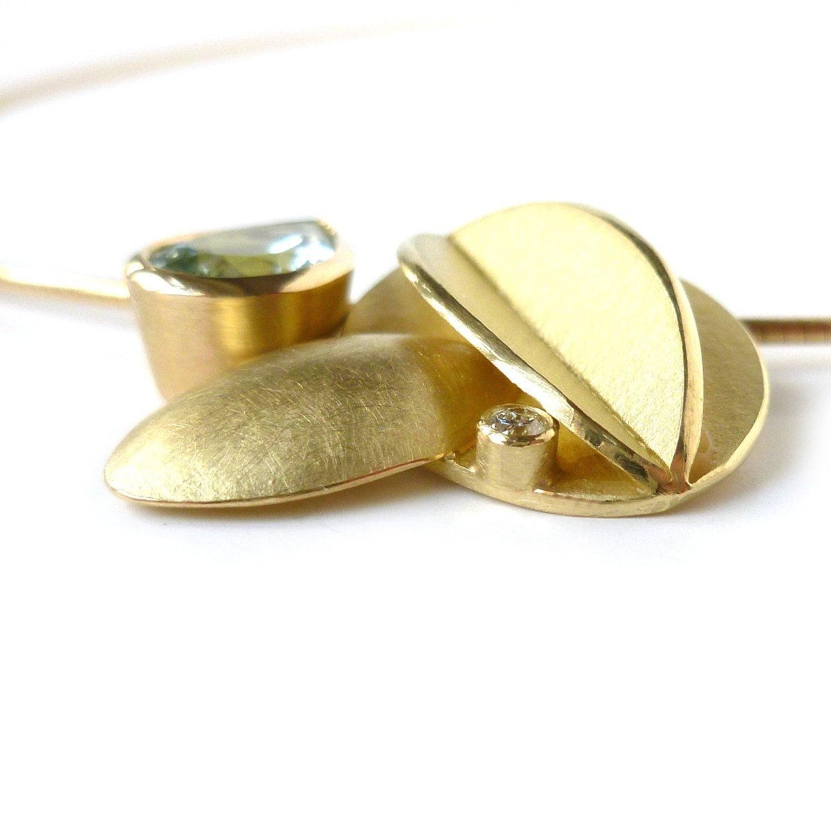 Contemporary bold and modern gold and aquamarine necklace handmade by designer maker Sue Lane Jewellery UK. Made to commission 