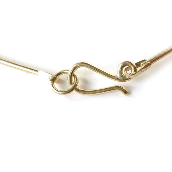 Contemporary bold and modern gold and aquamarine necklace handmade by designer maker Sue Lane Jewellery UK. Made to commission 