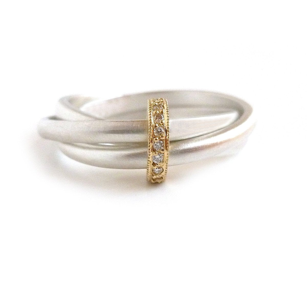 Unique modern silver and gold two tone Russian style wedding ring with diamonds 