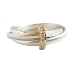 Unique modern silver and gold two tone Russian style wedding ring with diamonds 