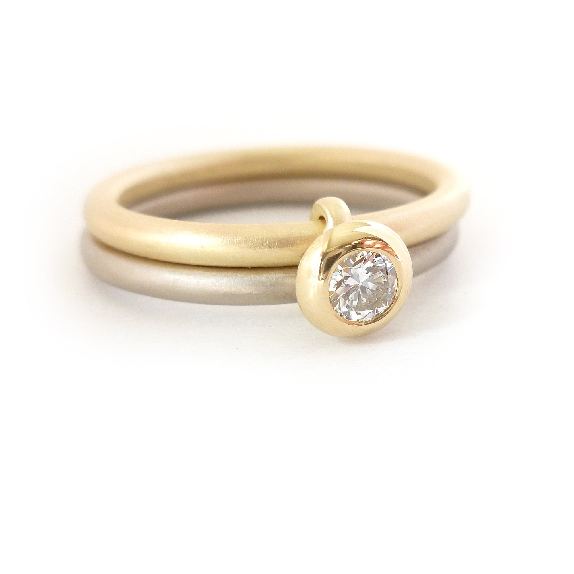 Contemporary, bespoke and modern 18k white and yellow gold two band stacking diamond wedding ring, engagement ring, matt brushed finish. Handmade by Sue Lane UK