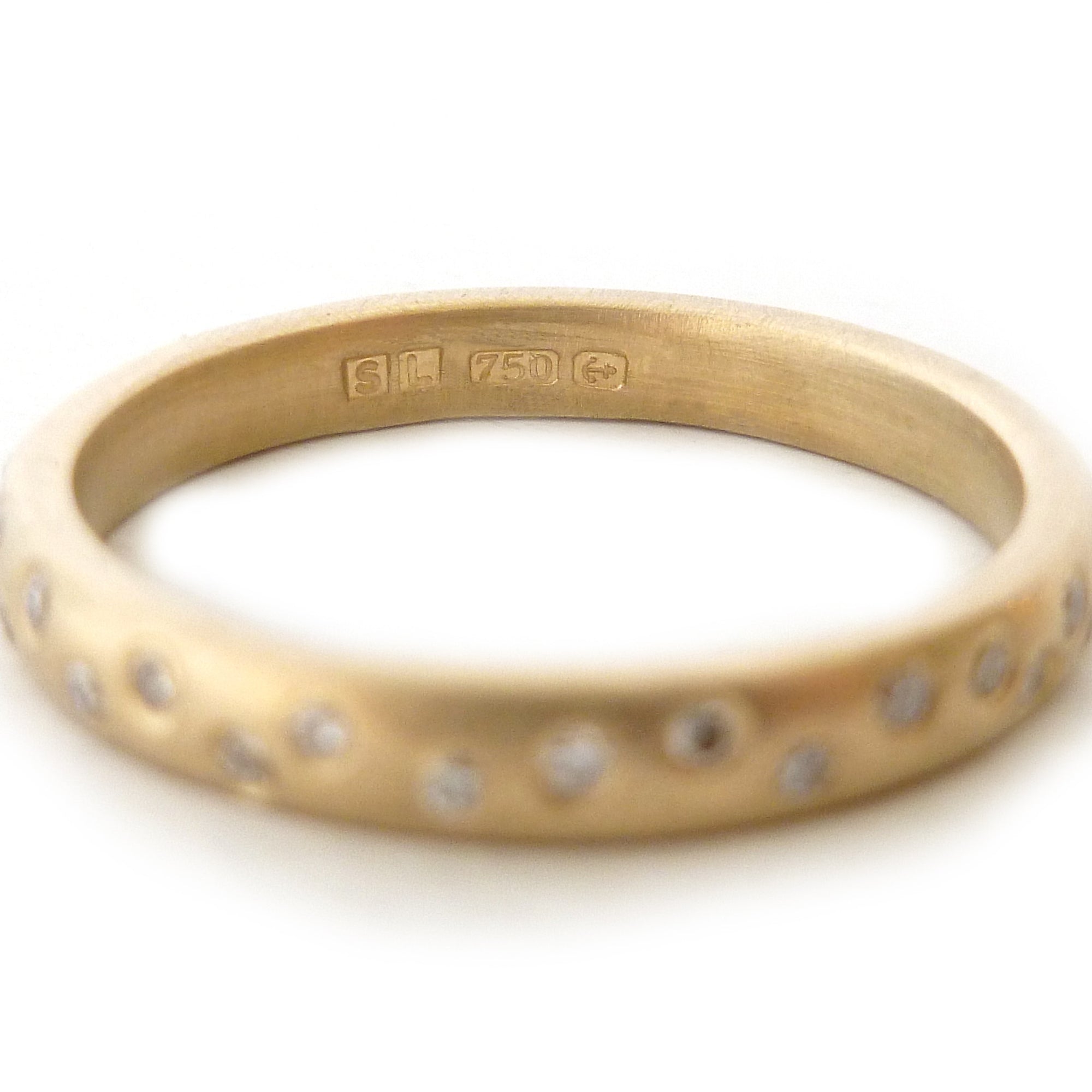 Modern, contemporary and unique handmade gold 12 diamond eternity ring, wedding ring, or engagement ring by Sue Lane Contemporary Jewellery, UK. Made to order.