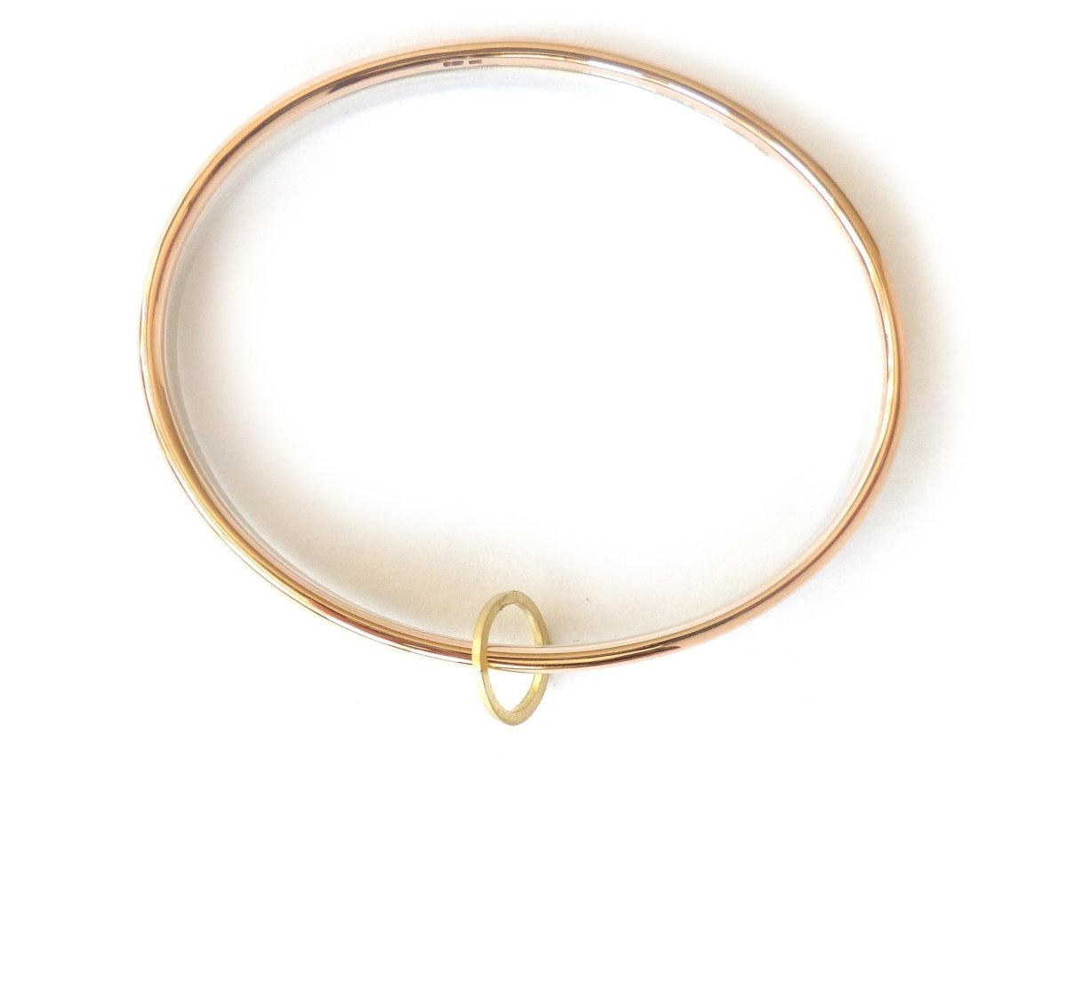 Unusual, unique, bespoke and modern three colour gold and silver bangle with brushed finish. Handmade by Sue Lane Contempoary Jewellery in Herefordshire, UK