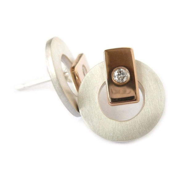 Contemporary and modern earrings in silver and 18k rose gold with a flush set diamond handmade by UK designer maker Sue Lane jewellery