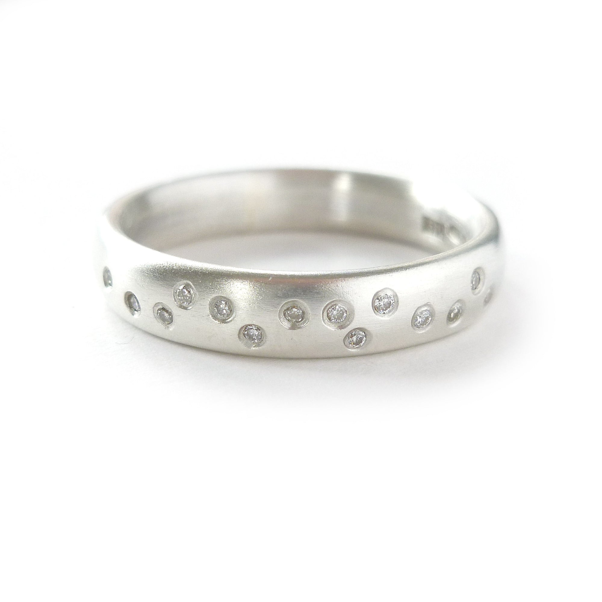 Unusual, unique, bespoke and modern silver and 12 diamond dress ring, wedding ring, eternity ring, engagement brushed finish. Handmade by Sue Lane Jewellery UK