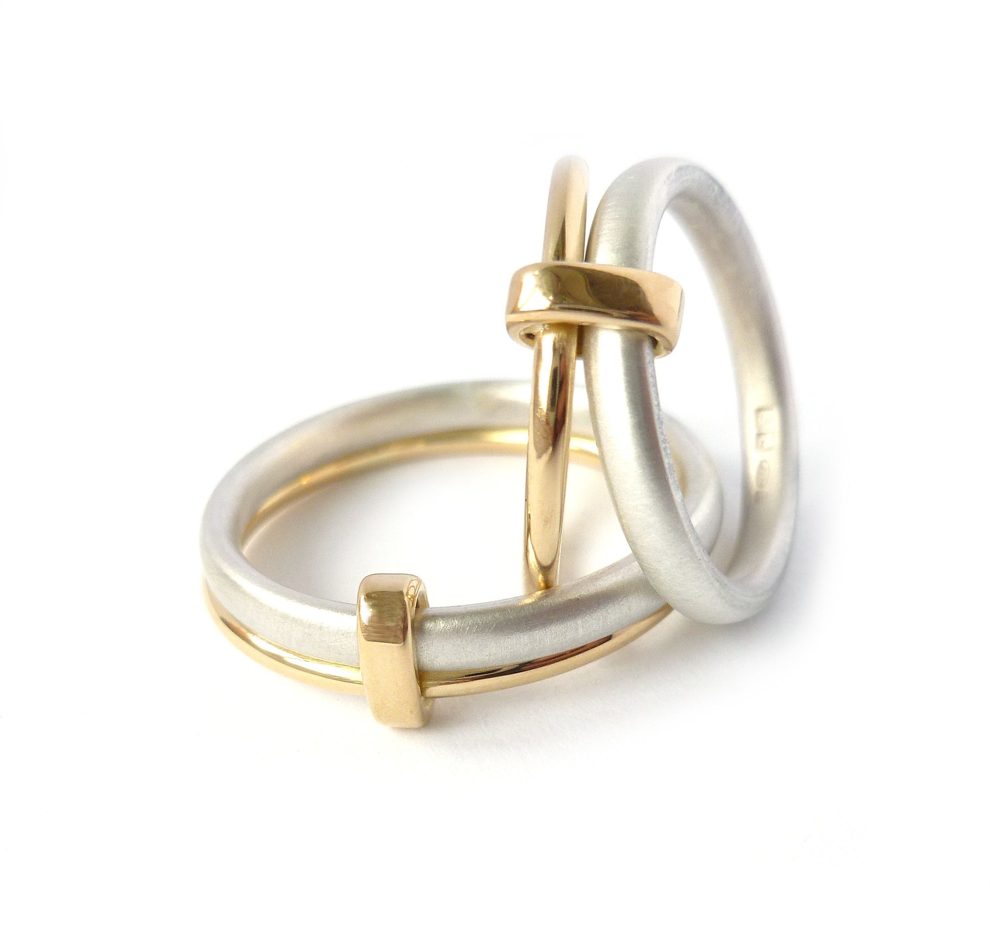 Unusual, unique, bespoke and modern women's/men’s wedding ring in silver and gold. Handmade by Sue Lane Jewellery in Herefordshire, UK. Unique wedding ring.