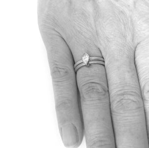 Contemporary, modern and bespoke 18k yellow gold and platinum marquise diamond ring. Handmade stacking ring by Sue Lane Jewellery. A unique engagement ring. Multi band ring or interlocking ring.
