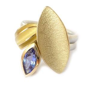 Unique, bespoke and modern statement tanzanite silver and gold stacking ringset handmade by designer Sue Lane contemporary Jewellery, UK