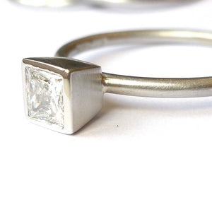 Contemporary, bespoke and modern platinum and square diamond engagement  ring, brushed finish. Handmade by Sue Lane UK