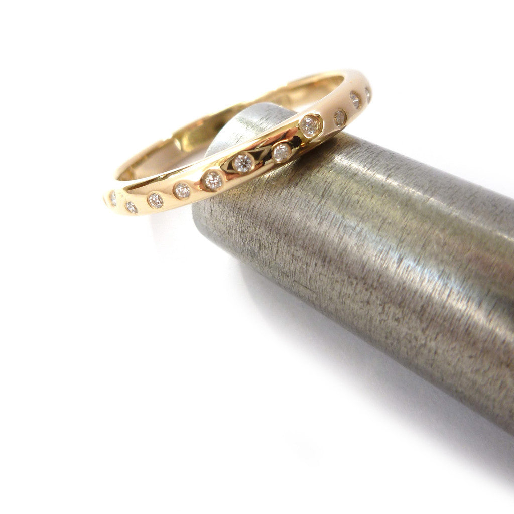 Contemporary and unique handmade gold 10 diamond modern eternity ring, bespoke wedding ring, or engagement ring by Sue Lane Contemporary Jewellery, UK.