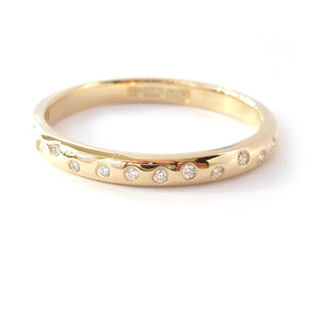 Contemporary and unique handmade gold 10 diamond modern eternity ring, bespoke wedding ring, or engagement ring by Sue Lane Contemporary Jewellery, UK.