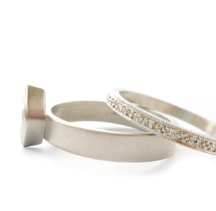 Contemporary, unique, bespoke and modern platinum marquise diamond engagement / wedding ring, eternity ring, matt brushed finish. Handmade by Sue Lane in Herefordshire, UK
