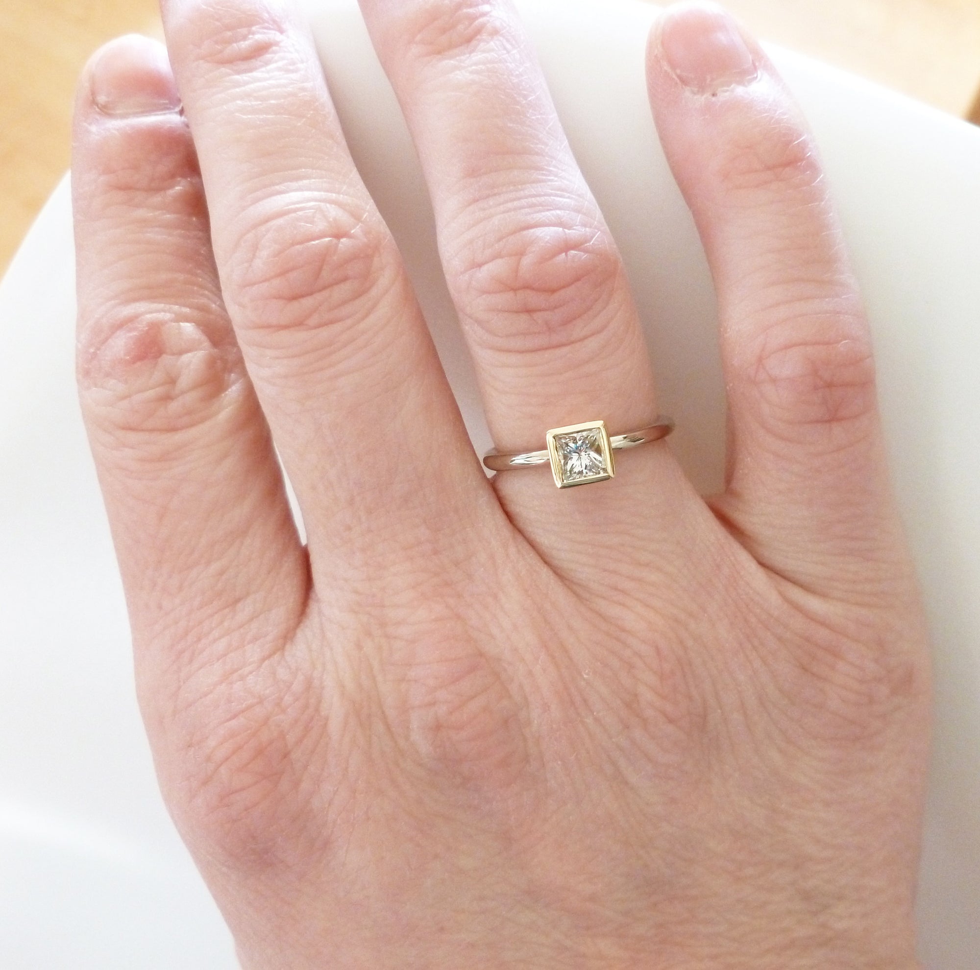 Contemporary, bespoke and modern 18k yellow gold square princess diamond engagement ring, commitment ring, matt brushed finish. Handmade by Sue Lane in Herefordshire, UK