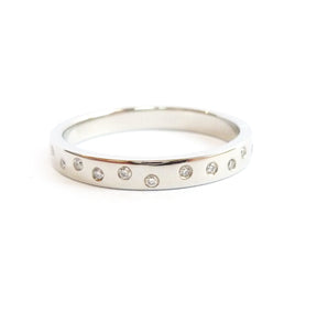 Contemporary platinum eternity ring. Bespoke jewellery by Sue Lane.